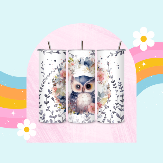 Owl drinks tumbler